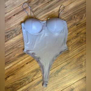 Purple Sparkly Bodysuit